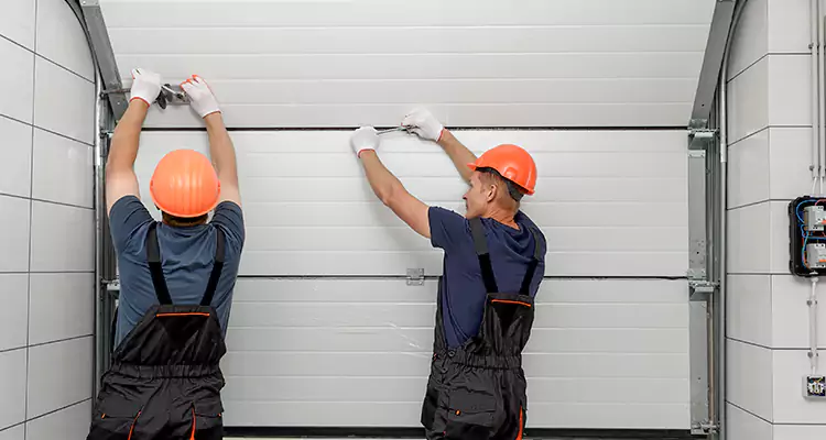 Garage Door Bottom Panel Repair in Meadow Woods, FL